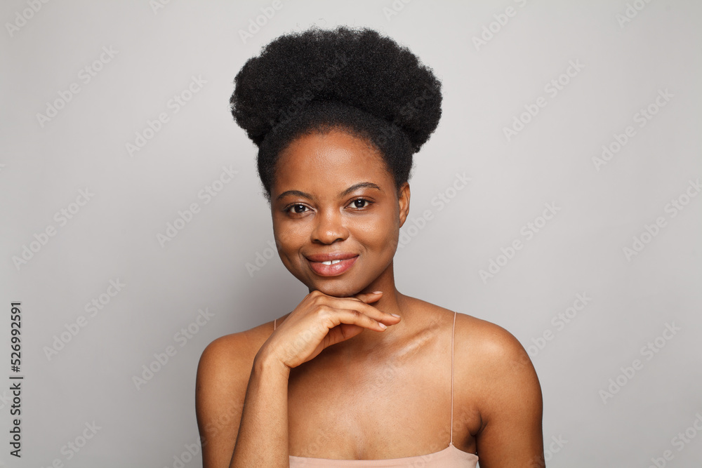 Cute woman with clean skin on white background. Facial treatment, spa, wellness and skincare concept Cute woman with clean skin on white background. Facial treatment, spa, wellness and skincare concept