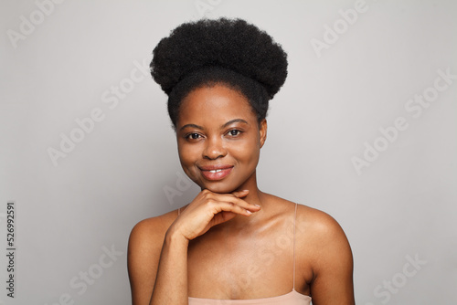 Cute woman with clean skin on white background. Facial treatment, spa, wellness and skincare concept