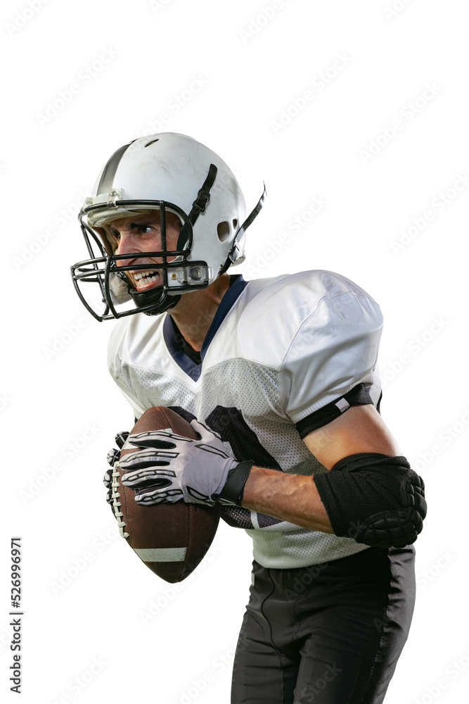 Portrait of motivated and concentrated man, american football player in uniform posing isolated over white background