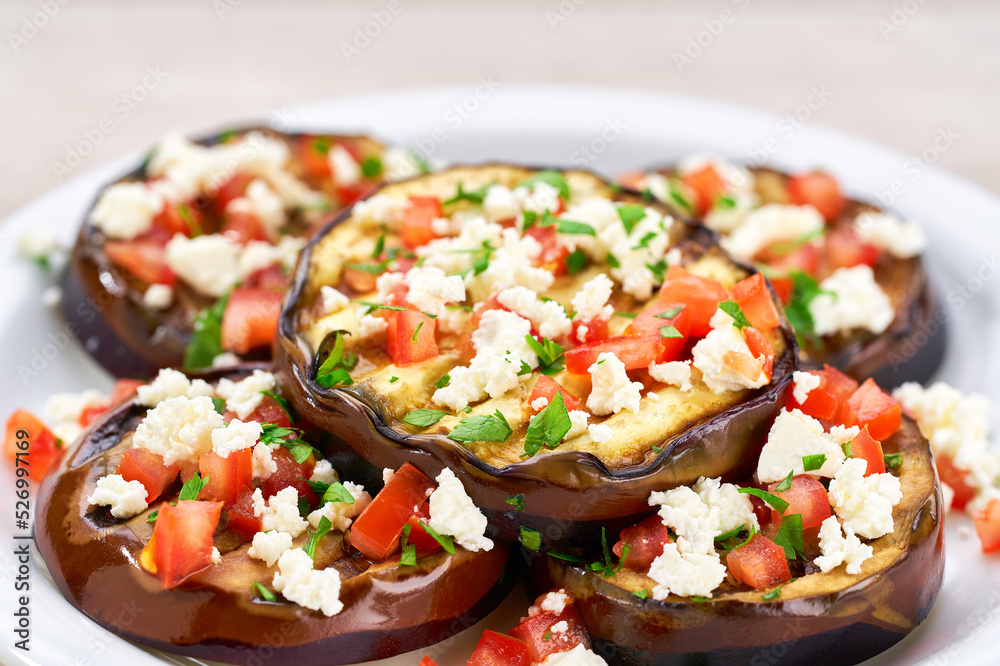 close up homemade eggplant salad with cheese and tomatoes,selective focus. close up homemade eggplant salad with cheese and tomatoes,selective focus.