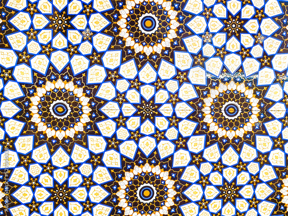 traditional Uzbek pattern on ceramic tile on wall of mosque Seamless old floral pattern Abstract background