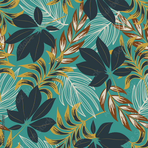 Fashionable seamless tropical pattern with bright plants and leaves on a blue background. Seamless exotic pattern with tropical plants. Beautiful exotic plants. 