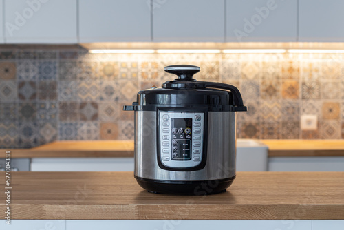 Fototapeta Modern multi cooker in kitchen