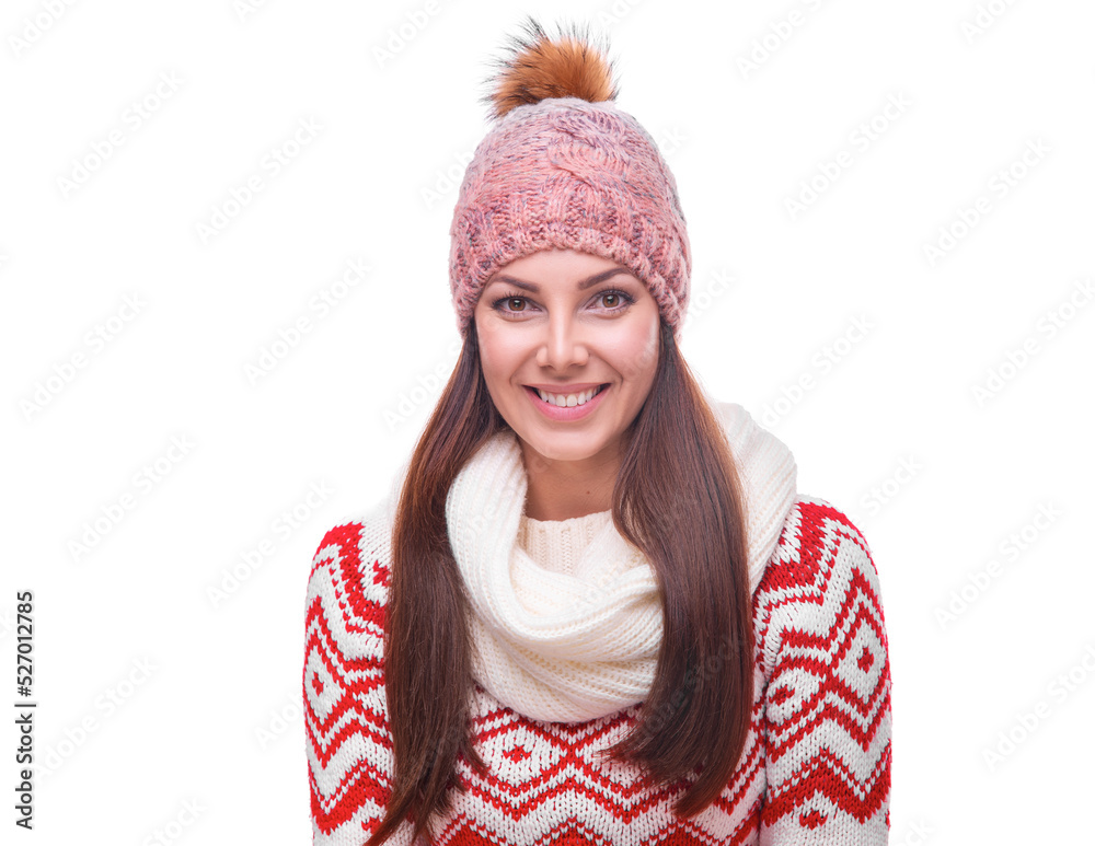 Beautiful young woman in a sweater and a warm hat smiling posing on a white background. Beautiful young woman in a sweater and a warm hat smiling posing on a white background.