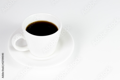 international coffee day, traditional colombian drink, closeup of coffee mug with white background and copy space