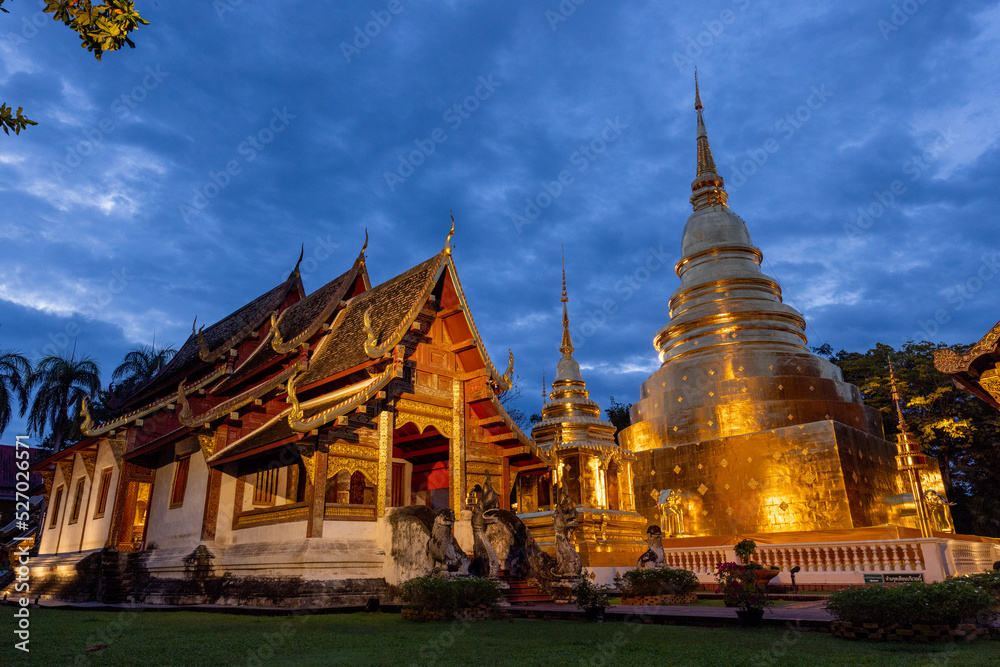 Naklejka premium The royal monastery was beautifully lit up at night. and the sky at twilight 
