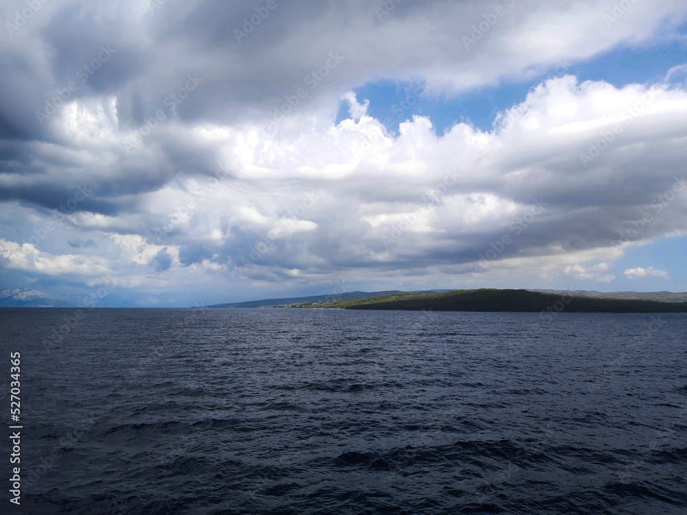 Fototapeta premium clouds over the sea