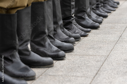 Soldiers in the ranks. Tarpaulin military boots. Tarpaulin boots on the feet of the military in the form of the army of the Soviet Union.