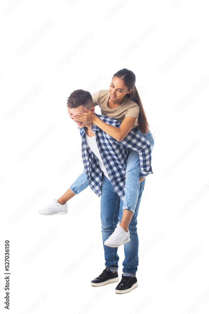 Male carrying his girlfriend piggyback Male carrying his girlfriend piggyback