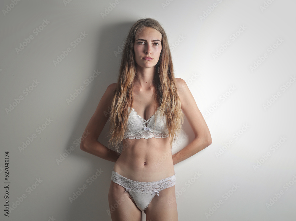 Fototapeta premium portrait of a young beautiful woman in lingerie
