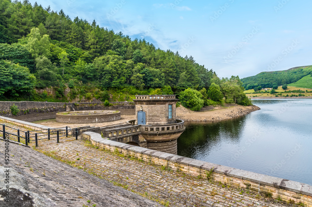 A view from the dam wall towards the west shore of Ladybower reservoir, Derbyshire, UK in summertime