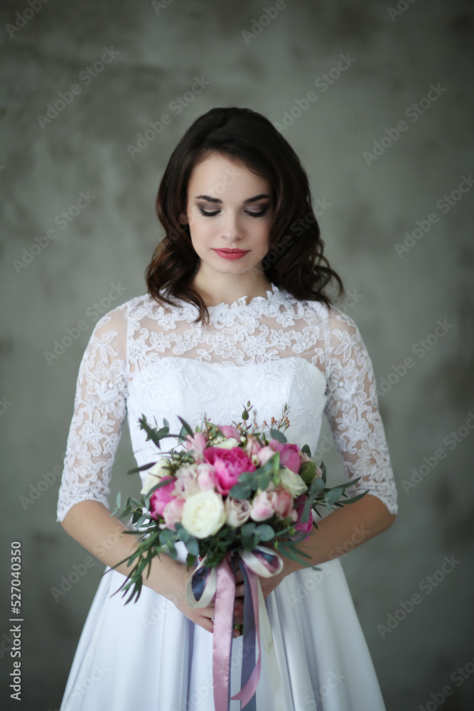 From graceful twirls to playful poses, this stunning black-haired bride shines in a beautiful white wedding dress, capturing the magic and excitement of a once-in-a-lifetime moment in the comfort