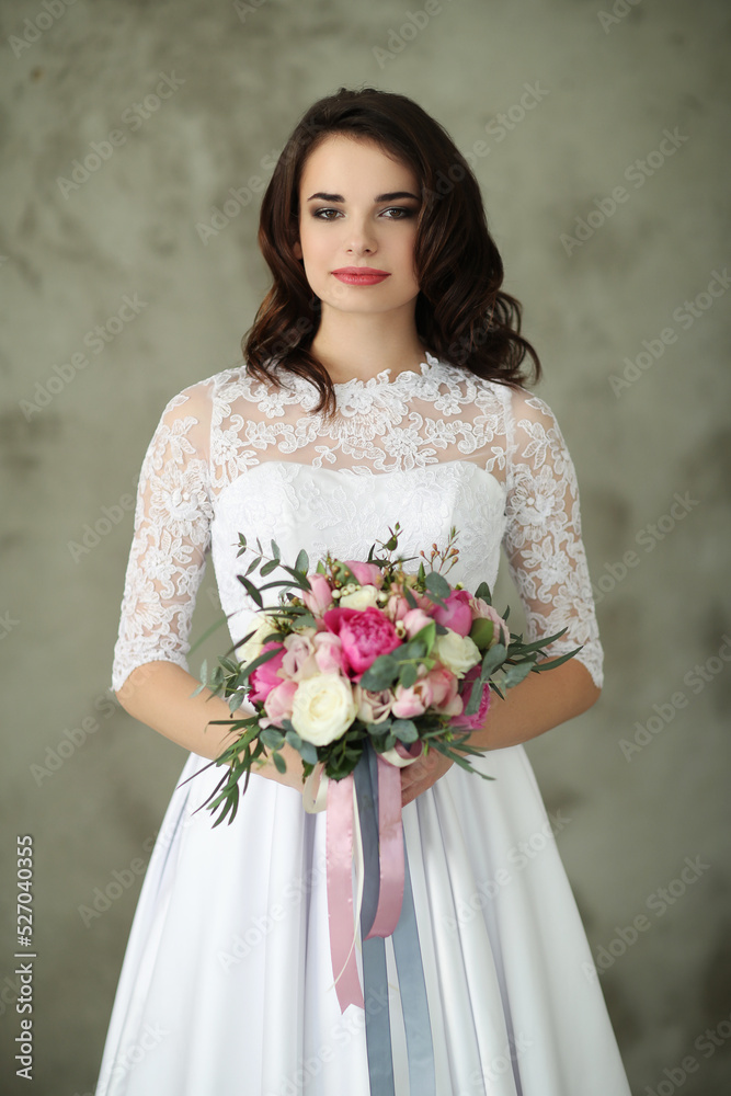 From graceful twirls to playful poses, this stunning black-haired bride shines in a beautiful white wedding dress, capturing the magic and excitement of a once-in-a-lifetime moment in the comfort