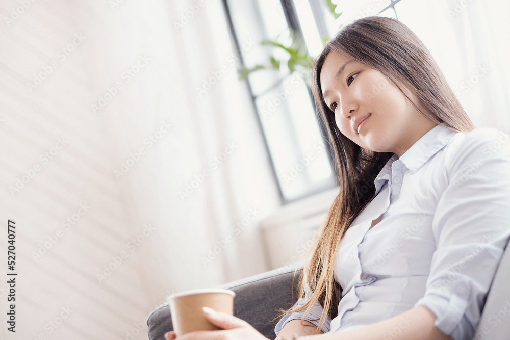 Post-Office Serenity: A Young Asian Woman Captured in Different Poses during a Relaxing Photoshoot