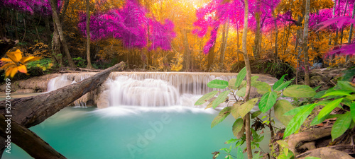 Fototapeta Naklejka Na Ścianę i Meble -  Amazing in nature, beautiful waterfall at colorful autumn forest in fall season	
