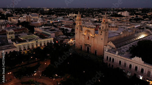 Aerial camera at night showing the front of the Cathedral of Merida, Yucatan, Mexico. photo