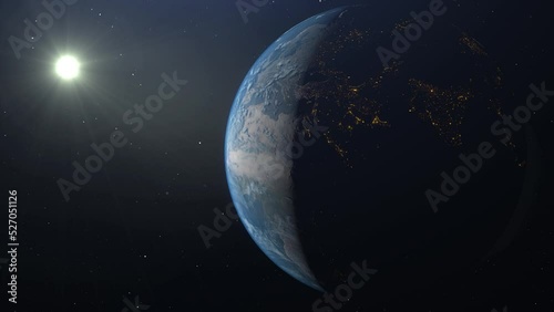 Planet earth rotating lit by the sun - 3D animation