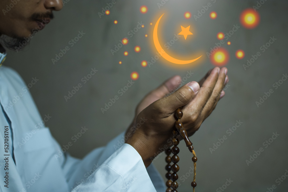 Φωτογραφία Religious muslim islam man in white session lift two hand for praying to Allah in mosque, isolated on dark background