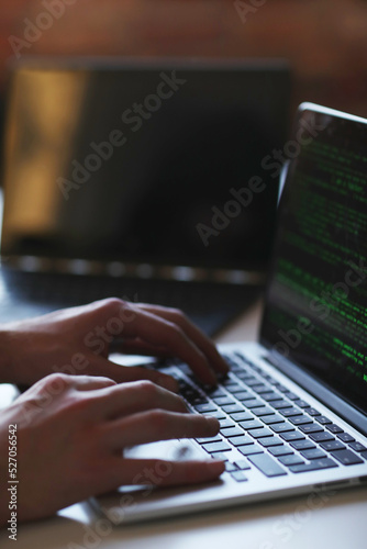 Wallpaper Mural Behind the Screen: A Hacker's World Revealed as He Works on His Computer in a House Near the Window Torontodigital.ca