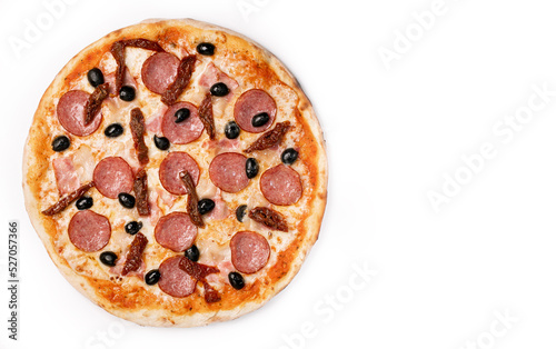 Fresh pizza with salami, olives, Sun dried tomatoes and cheese isolated on white background. Copyspace. Top view