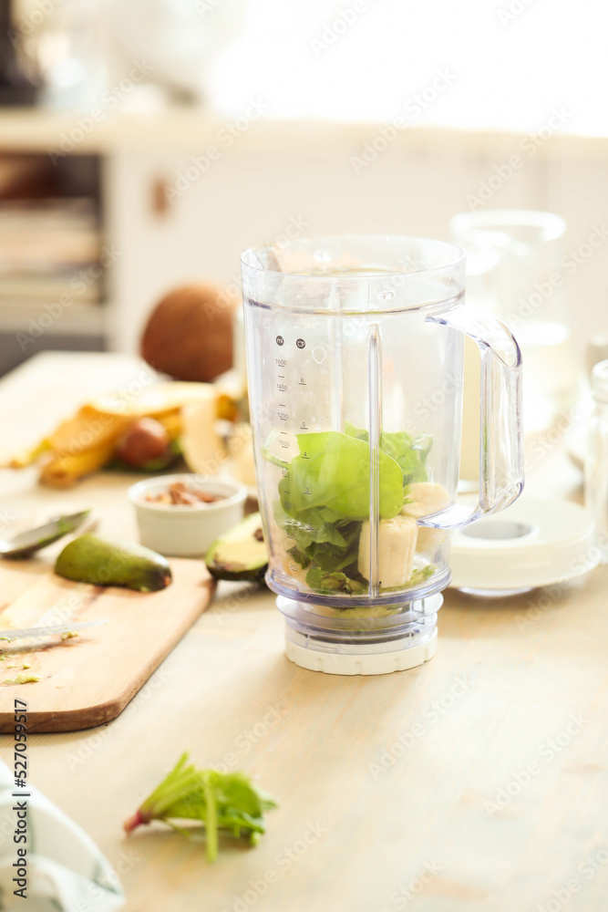 Healthy Habits in the Kitchen: Fitness Man Cooks Up a Delicious and Nutritious Salad and Milkshake Healthy Habits in the Kitchen: Fitness Man Cooks Up a Delicious and Nutritious Salad and Milkshake