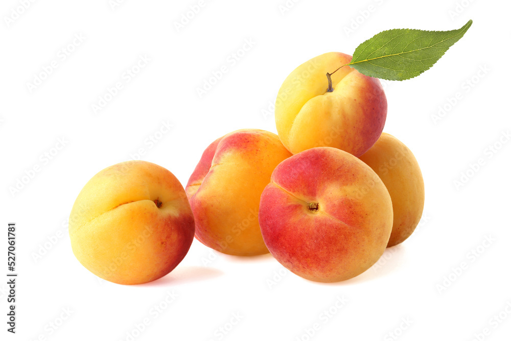 Ripe tasty apricots with leaf isolated on white Ripe tasty apricots with leaf isolated on white