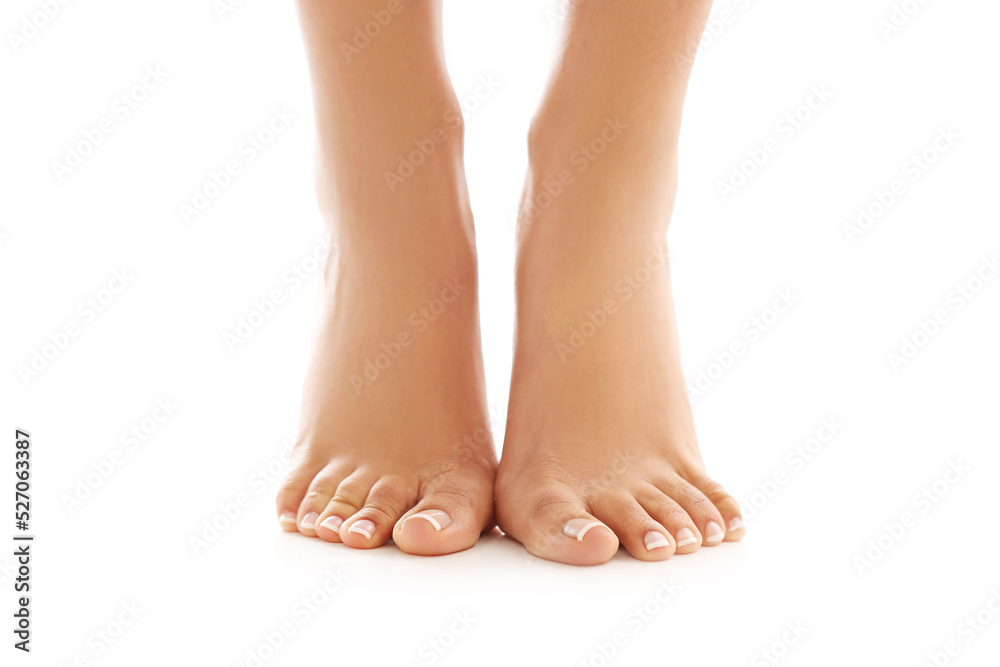 Beautiful groomed women’s legs on a white background Beautiful groomed women’s legs on a white background