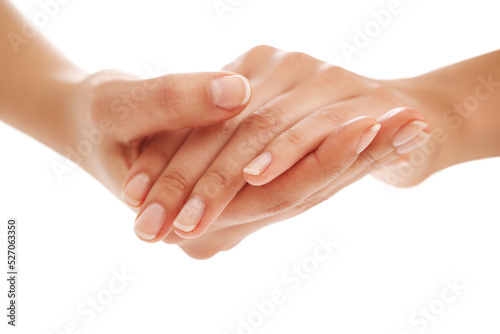 Beautiful woman hands with french manicure isolated on white background.