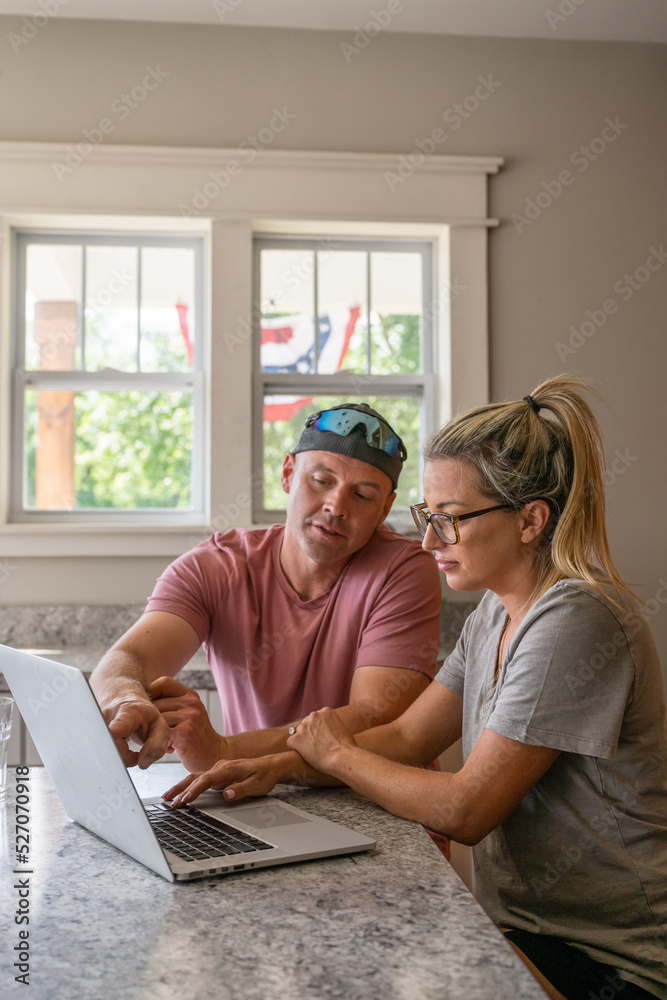 Marine veteran at home with family on a early morning in the kitchen.