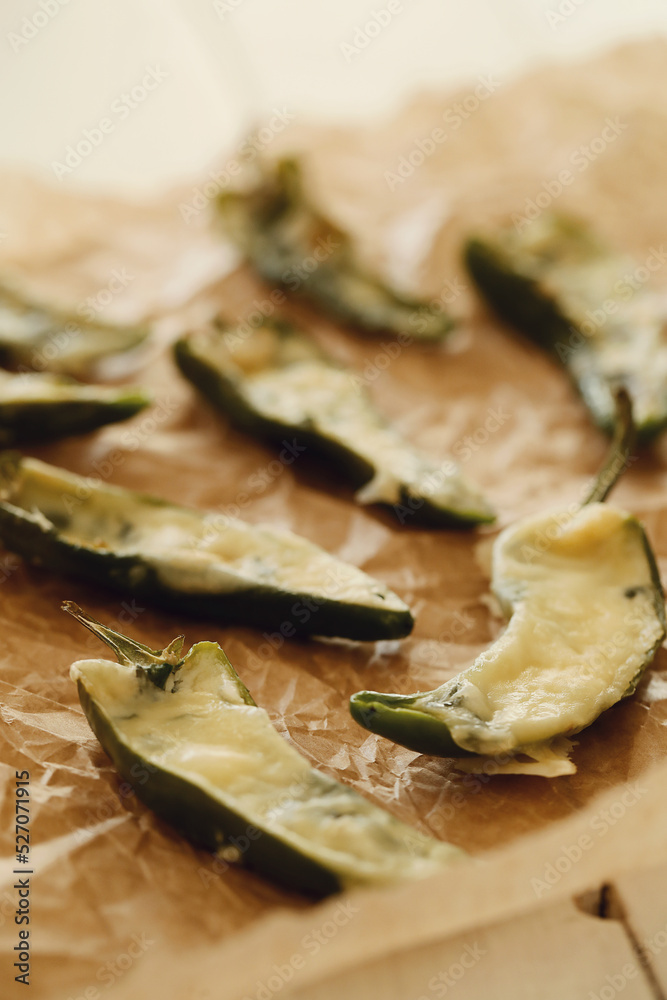 Delicious baked eggplant on parchment paper Delicious baked eggplant on parchment paper