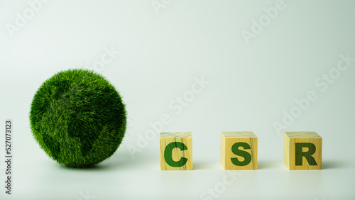 Corporate and community social responsibility give back CSR icon concept on green nature background.