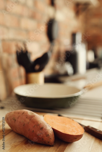 Fresh  sweet  sliced sweet potato on the kitchen table