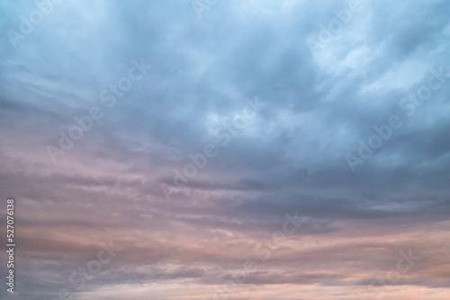 Unusual dark pink layered stratus clouds, skyscape.