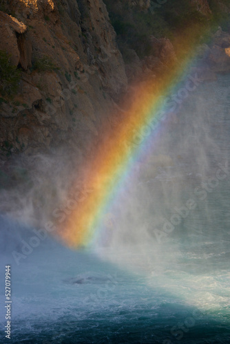 The beautiful rainbow in the waterfall spray