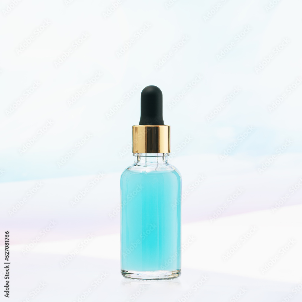 One mockup blue glass bottles on glass shelf. cosmetics collagen serum,organic essential or aroma oil for beauty skin care on white background One mockup blue glass bottles on glass shelf. cosmetics collagen serum,organic essential or aroma oil for beauty skin care on white background