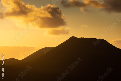 Beautiful silhouette of Lanzarote volcanos at sunset  Canary Islands   Spain