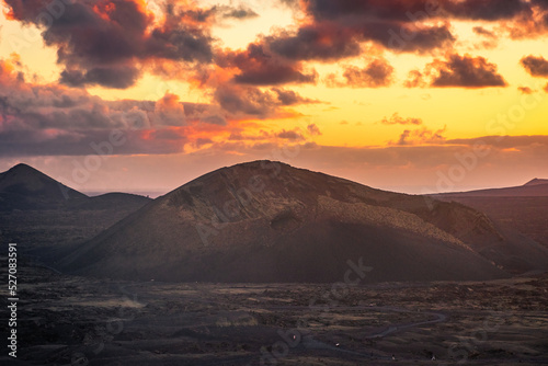 Amazing sunset over El Cuervo Volcano, in Lanzarote, Canary Islands, Spain