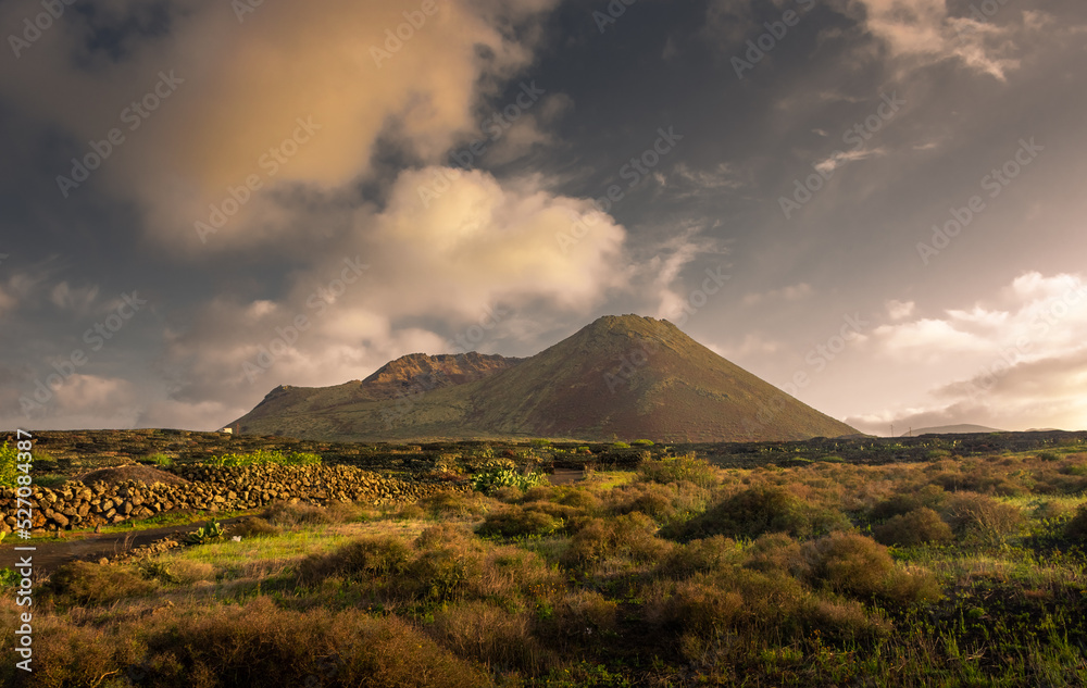 Beautiful sunset over the Monte Corona Volcano in Lanzarote,  Canary Islands, Spain