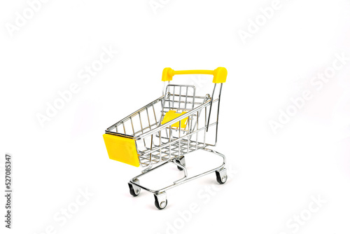 Yellow supermarket cart isolated on white background.