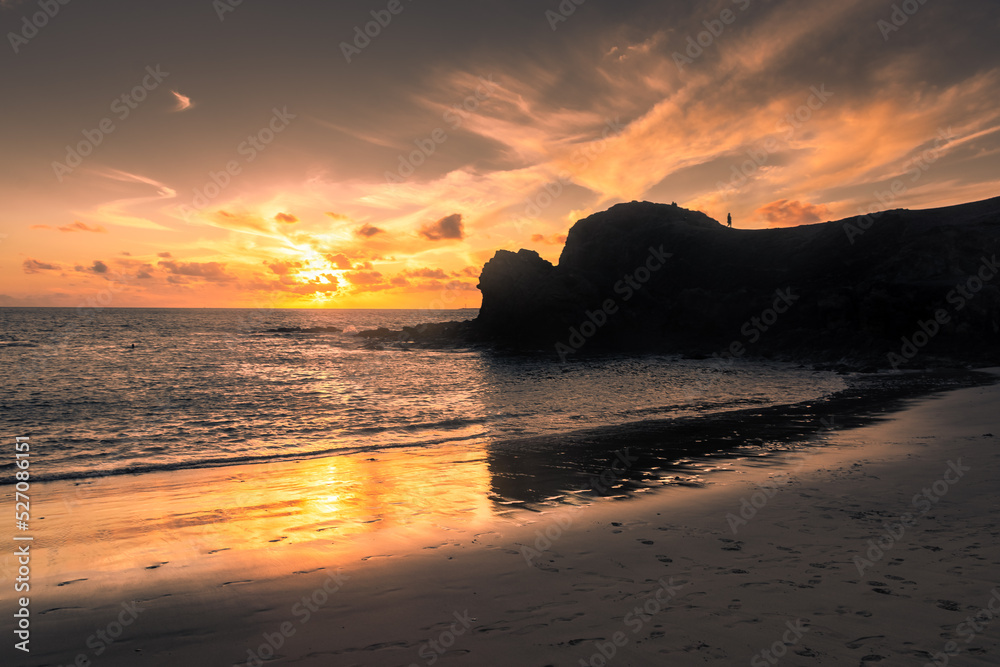 Beautiful sunset over the Atlantic Ocean at Papagayo Beach, Lanzarote, Canary Islands, Spain Beautiful sunset over the Atlantic Ocean at Papagayo Beach, Lanzarote, Canary Islands, Spain