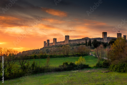 Sunset over the medieval fortified town of Monteriggioni  Tuscany   Italy