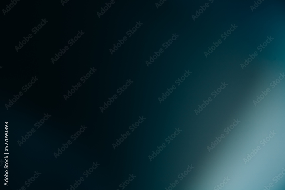 Blur glow background. Light flare. Bokeh beam reflection. Defocused blue white color gradient rays on dark black abstract copy space texture.