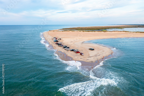 Aerial View of trucks on the beach and people fishing at Cape Point in Hatteras North Carolina