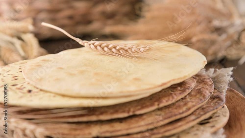 Spianata Sarda. Typical tortilla bread in italy Sardinia region. Baking bread Thin round with different flour. High quality 4k footage. Vertical video photo