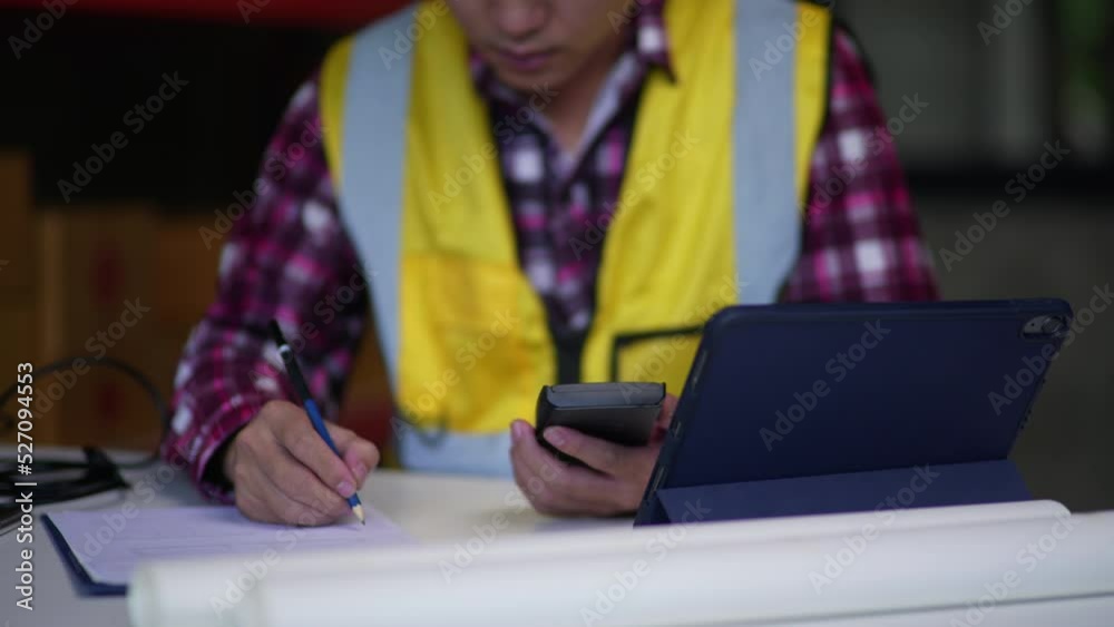 Logistic workers are checking and preparing the product parcel cardboard box in warehouse. Logistic workers are checking and preparing the product parcel cardboard box in warehouse.