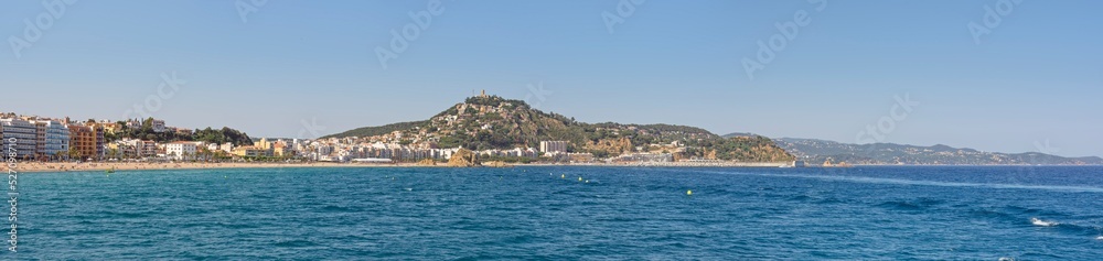 Coastline with Blanes beach towards Castle of Sant Joan, Catalonia.