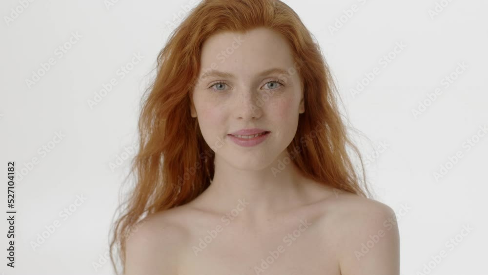 Beauty Woman face Portrait. Beautiful Spa model Girl with Perfect Fresh Clean Skin. Caucasian Female with Ginger haircut looking at camera and smiling. Youth and Skin Care Concept. Isolated on a white Beauty Woman face Portrait. Beautiful Spa model Girl with Perfect Fresh Clean Skin. Caucasian Female with Ginger haircut looking at camera and smiling. Youth and Skin Care Concept. Isolated on a white