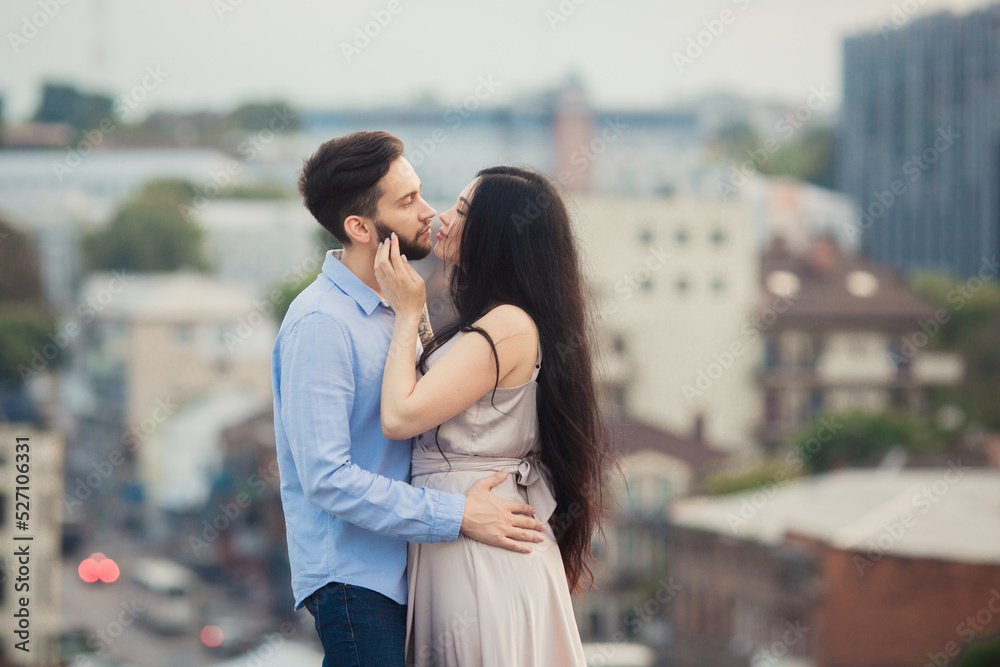 Fototapeta premium Smiling, loving, beautiful people spend time together outdoors. couple in love outdoors.Concept of love, people, happiness and lifestyle.