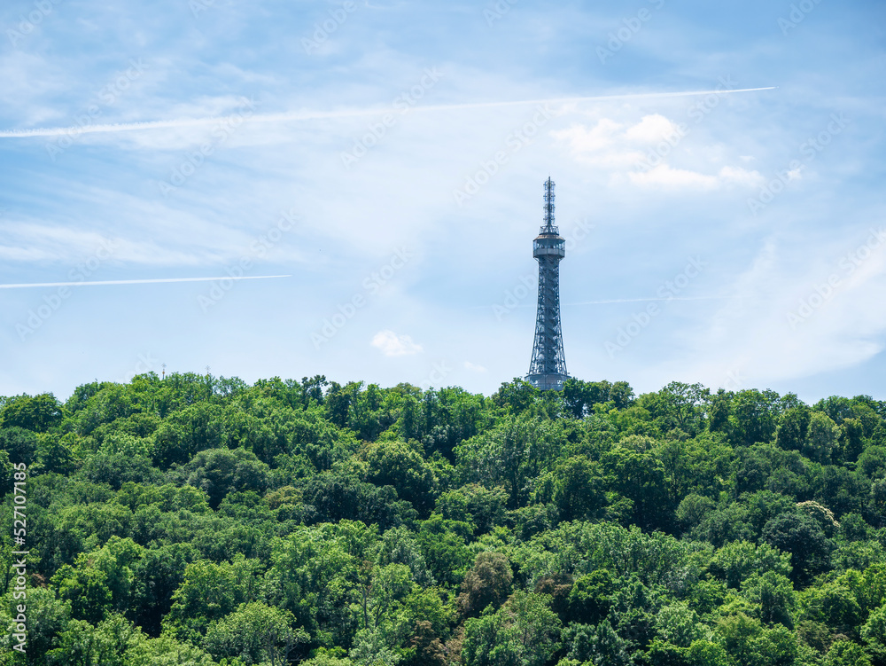 Prague, Czech Republic - June 2022: View with Petrin Tower, a major tourist attraction in Prague Prague, Czech Republic - June 2022: View with Petrin Tower, a major tourist attraction in Prague