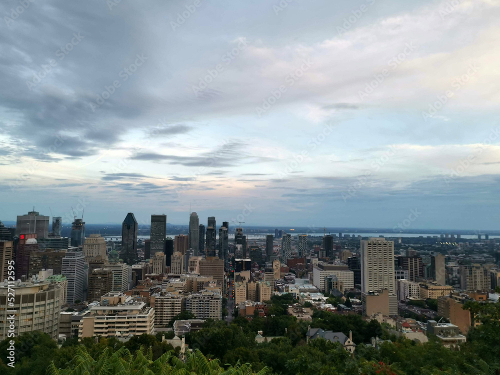 Mount Royal hill mountain hike viewpoint over the city skyline by night evening in toronto canada